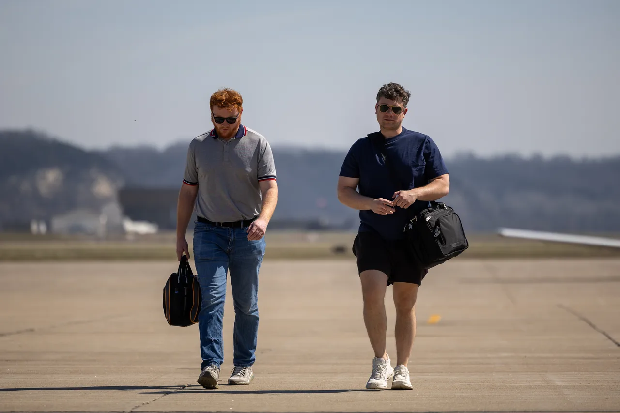 Pilots walking the ramp at Jefferson City Flying Service